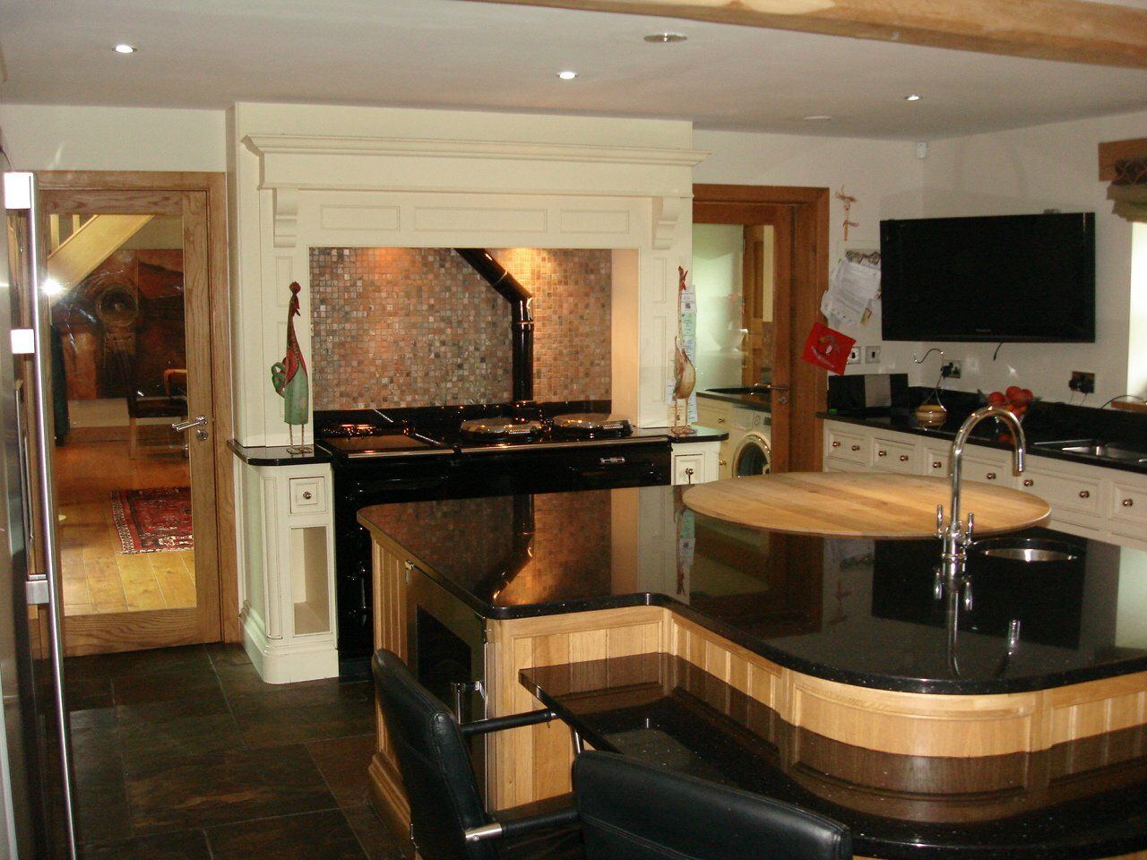 Kitchen with central island in a home marketed by Anthony Brown